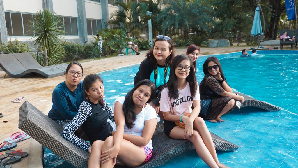 Female employees pose for a photo op in the FilWeb Asia in 2018 summer getaway