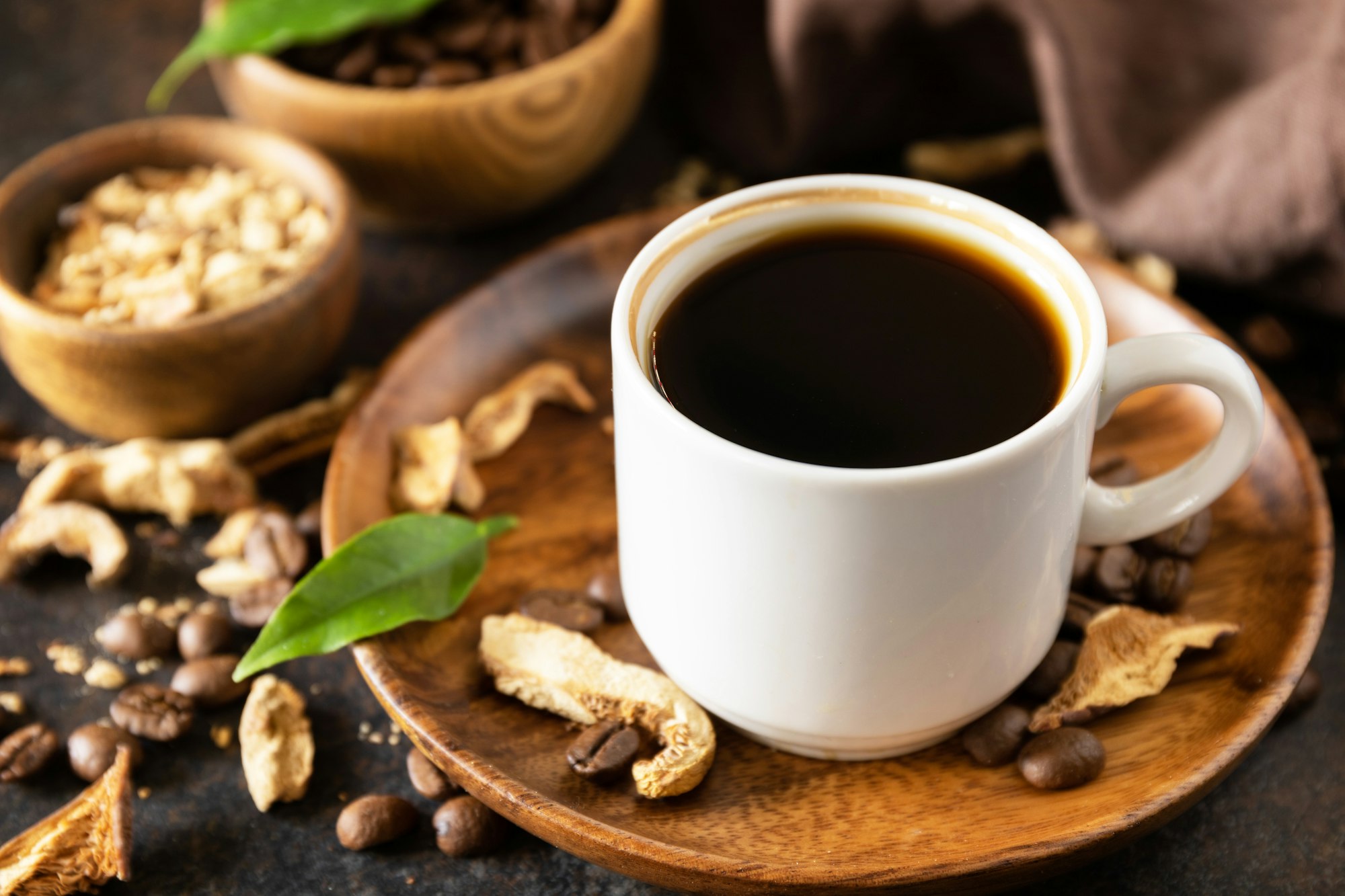 Coffee in a cup and coffee beans, trendy drink.